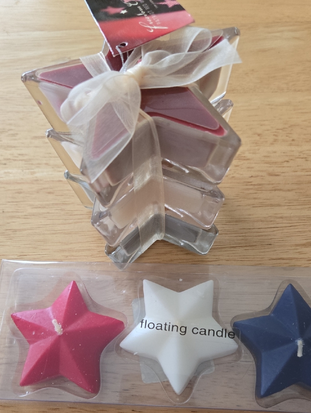 Three Red White Blue Star Candles Floating